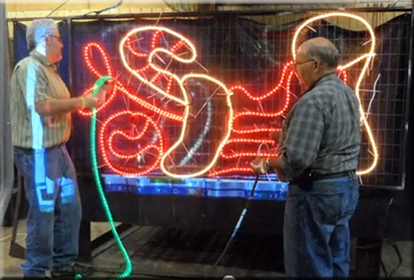 KP Employees working on Making Spirits Bright Display